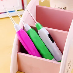 LED light earpick with tweezer