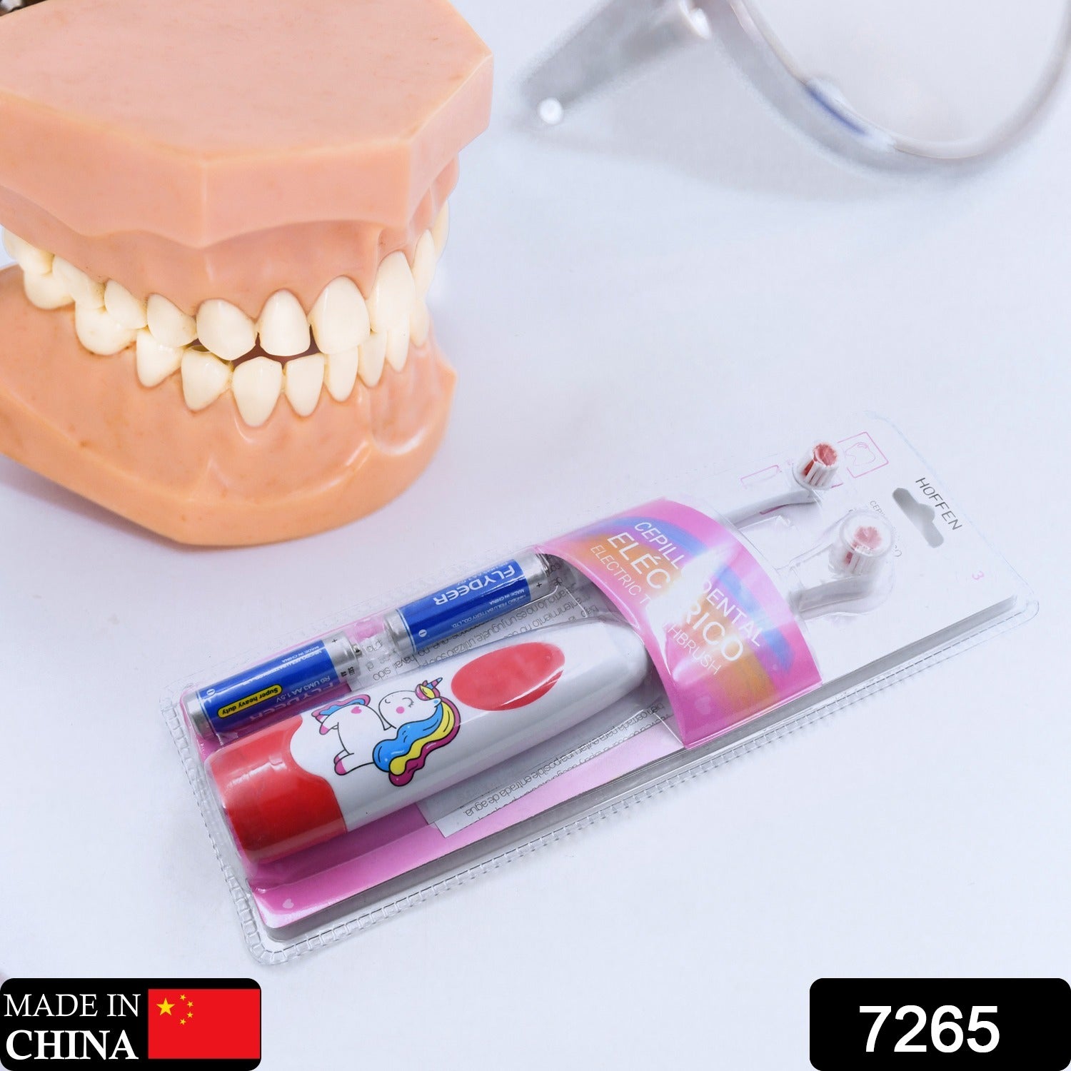 Electric toothbrush for travel with additional brush head and batteries