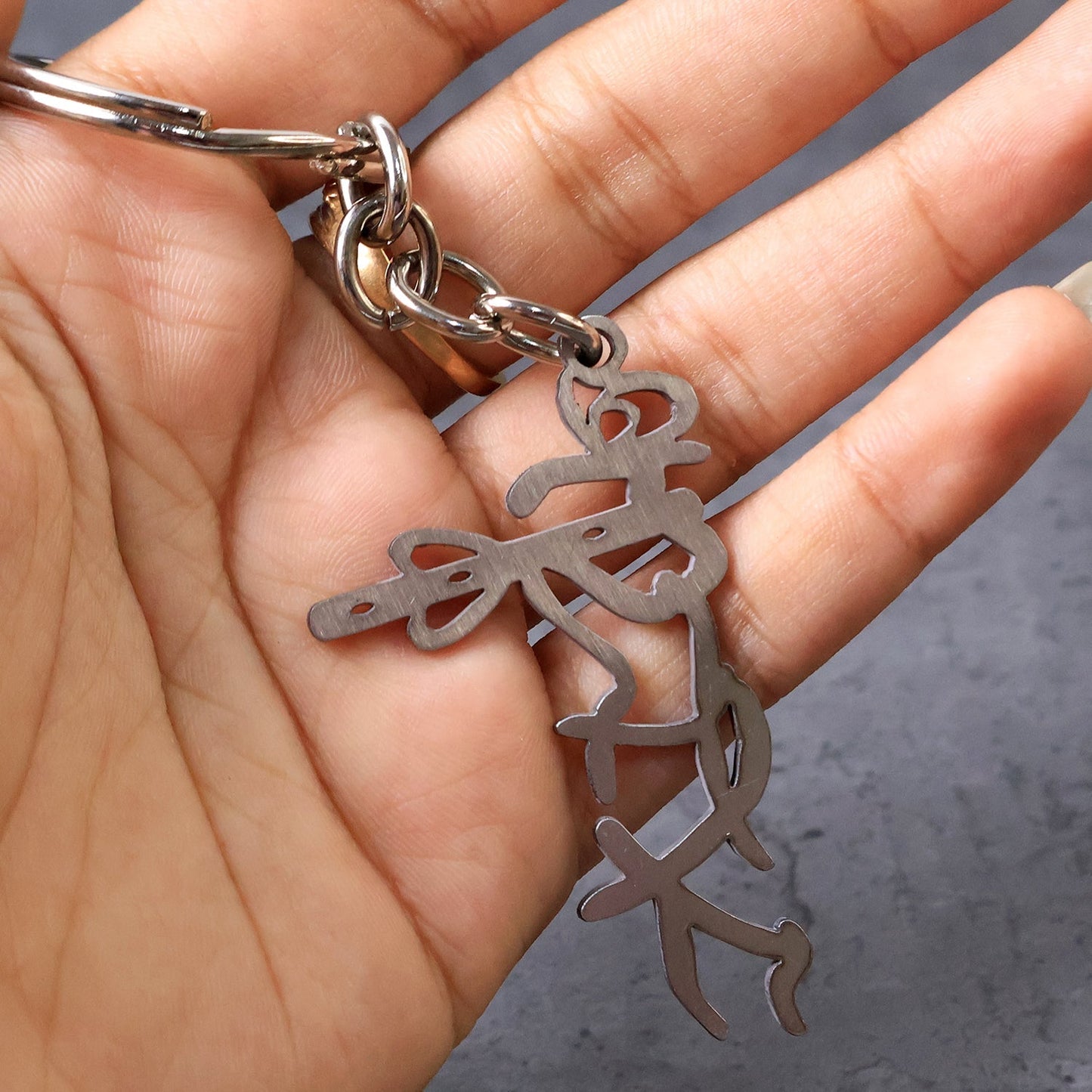 Auspicious Krishna Flute Style Metal Key Holder